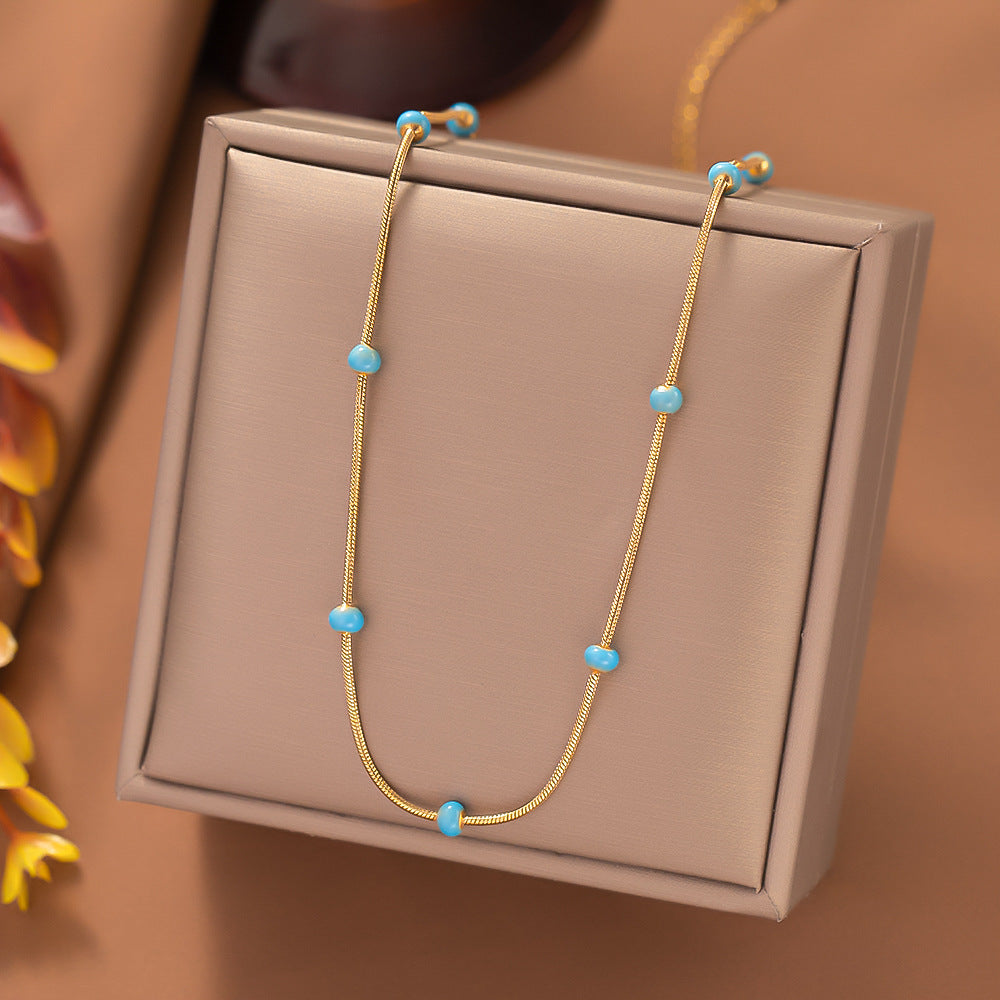 Halskette mit glasierter Kugelform aus Titanstahl für Damen mit farblosem und fortschrittlichem Sinn, einfaches und vielseitiges Halsbandketten-Zubehör