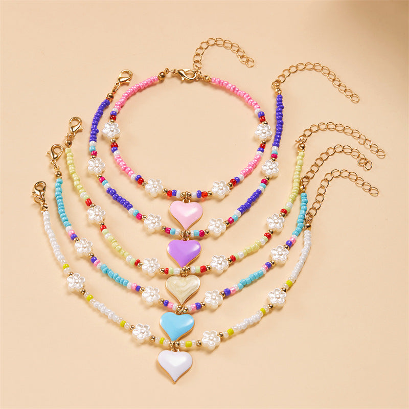 Bracelet de cheville en perles de fleurs et de cœur d'amour à la mode pour femmes